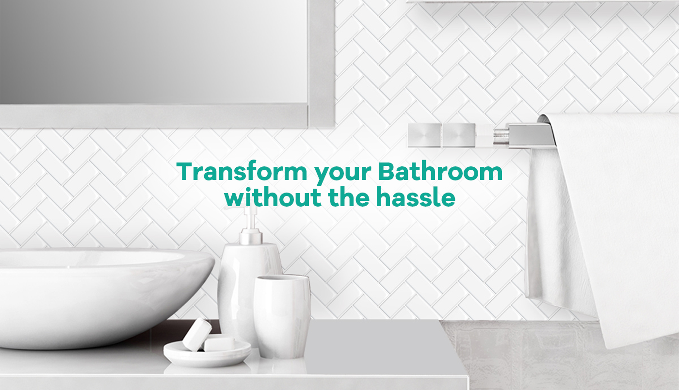 White herringbone tiles in a bathroom with a text saying: Transform your bathroom without the hassle