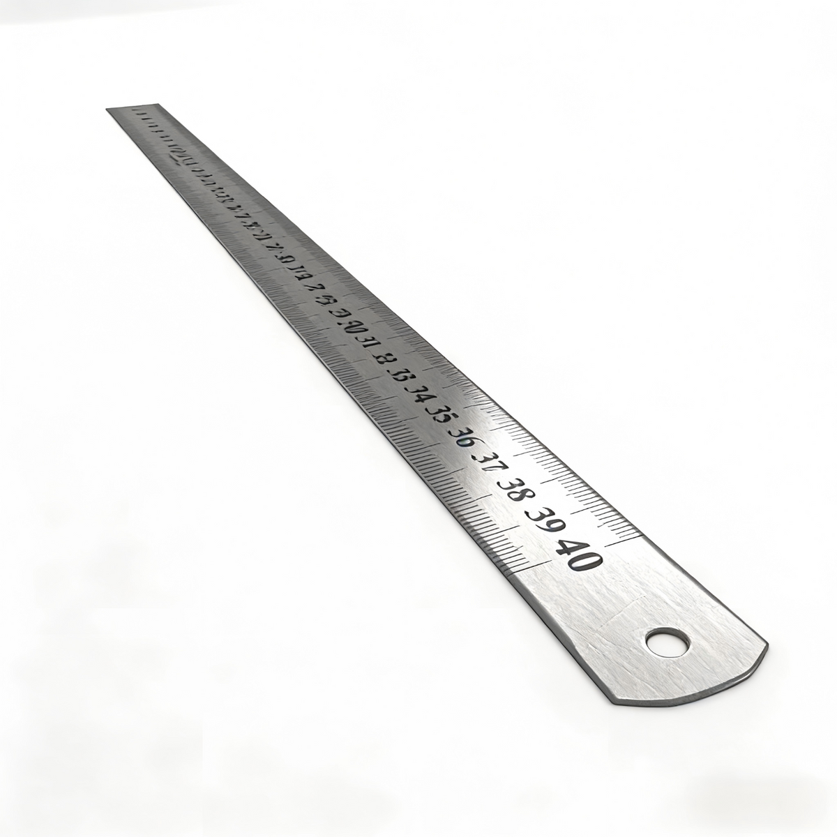 Metal ruler with measurement markings on a white background