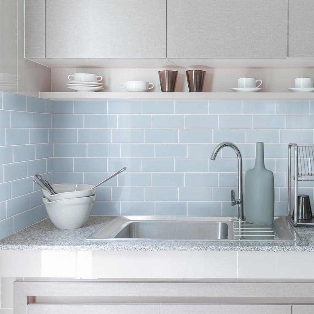 Blue peel and stick subway tiles in kitchen