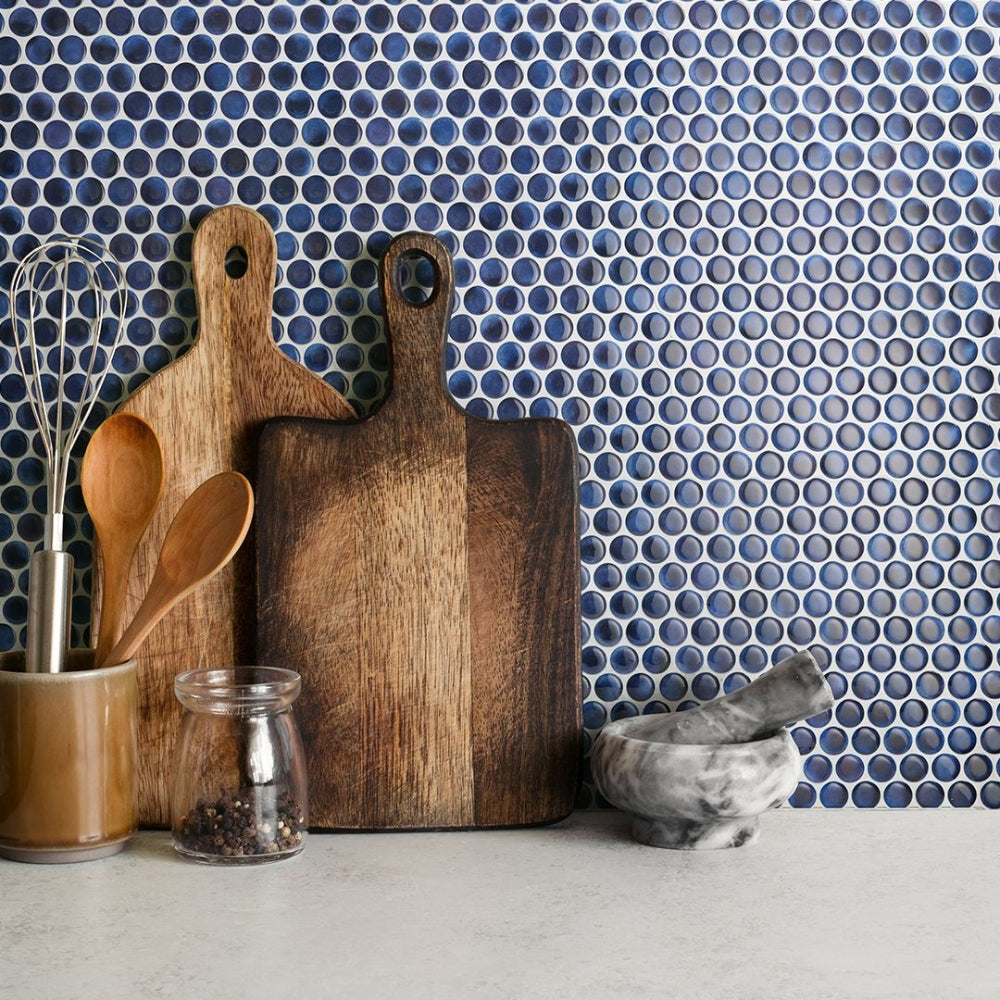 Blue penny stick on wall tiles in kitchen