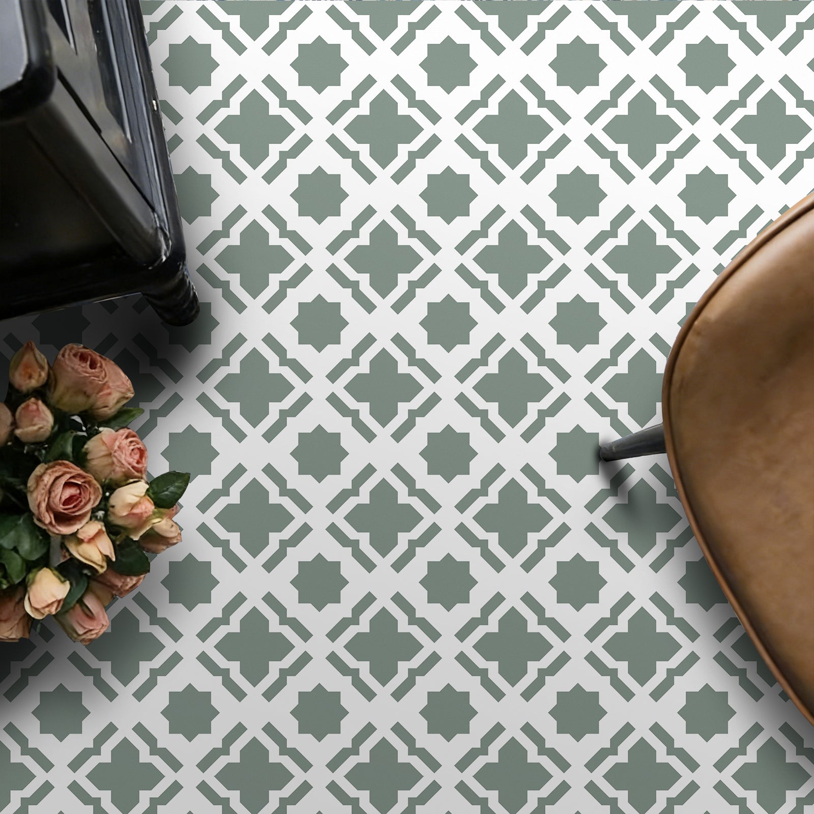 Patterned floor with geometric design, flowers, and a chair.