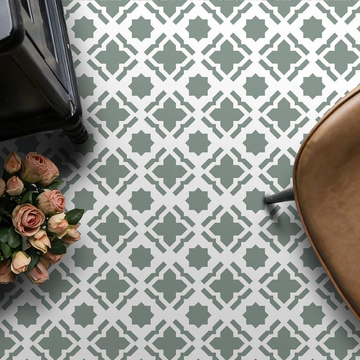 Patterned floor with geometric design, flowers, and a chair.