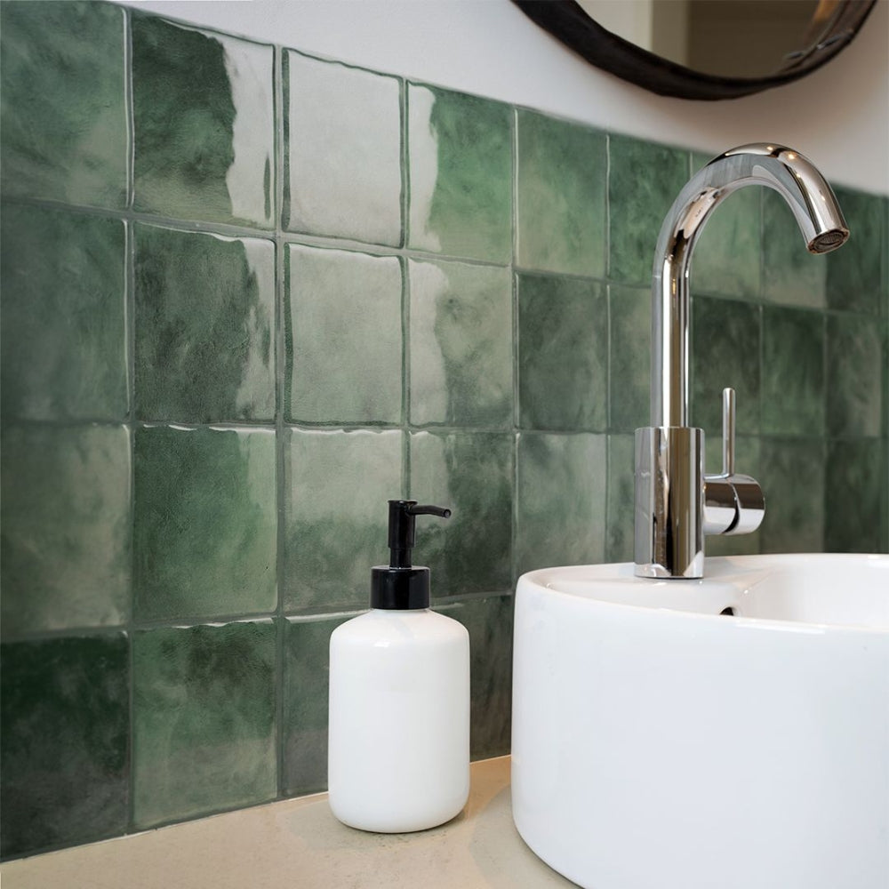 Green square tiles in bathroom