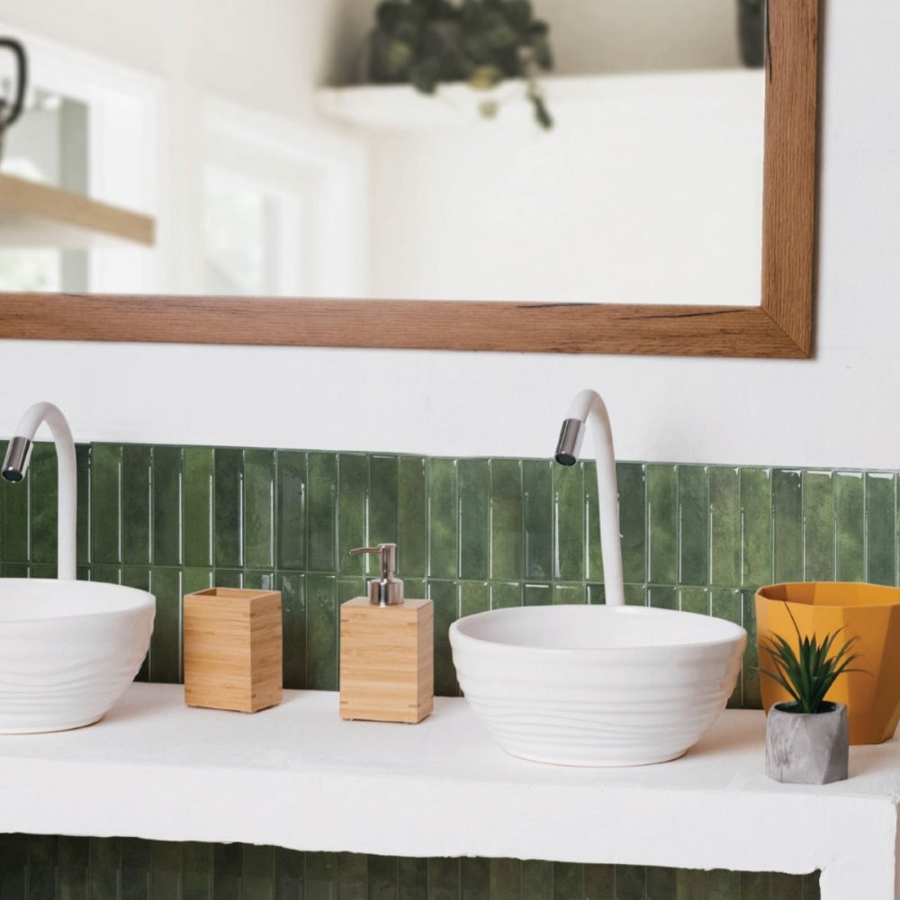 Green stacked subway tile over vanity