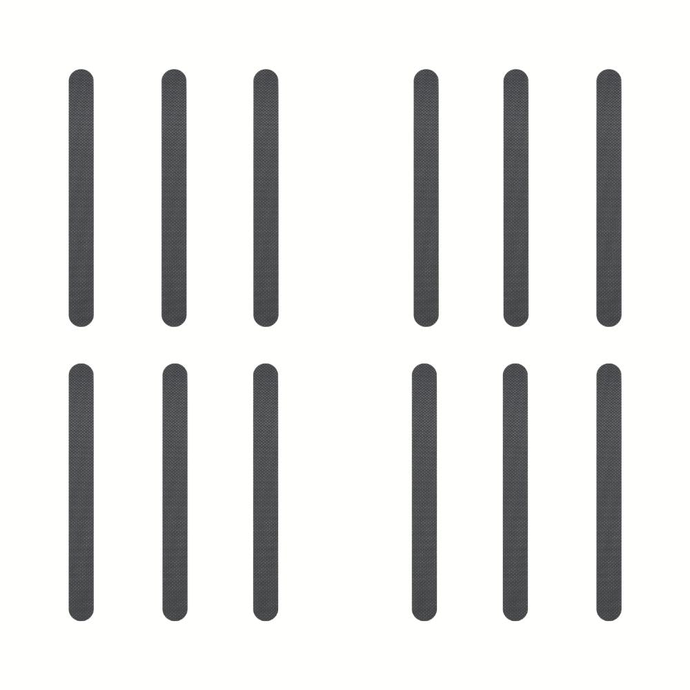 Grey anti-slip grip strips in bath