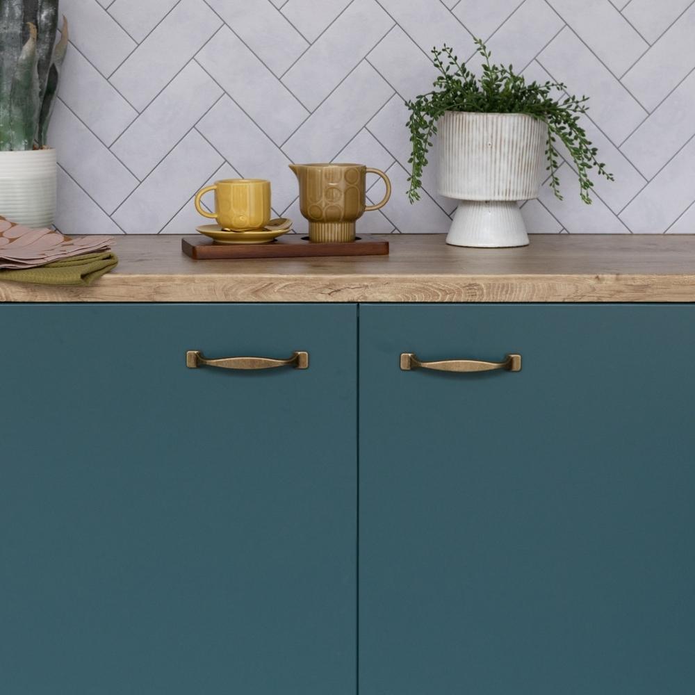 Metallic chevron vinyl wallpaper over counter top