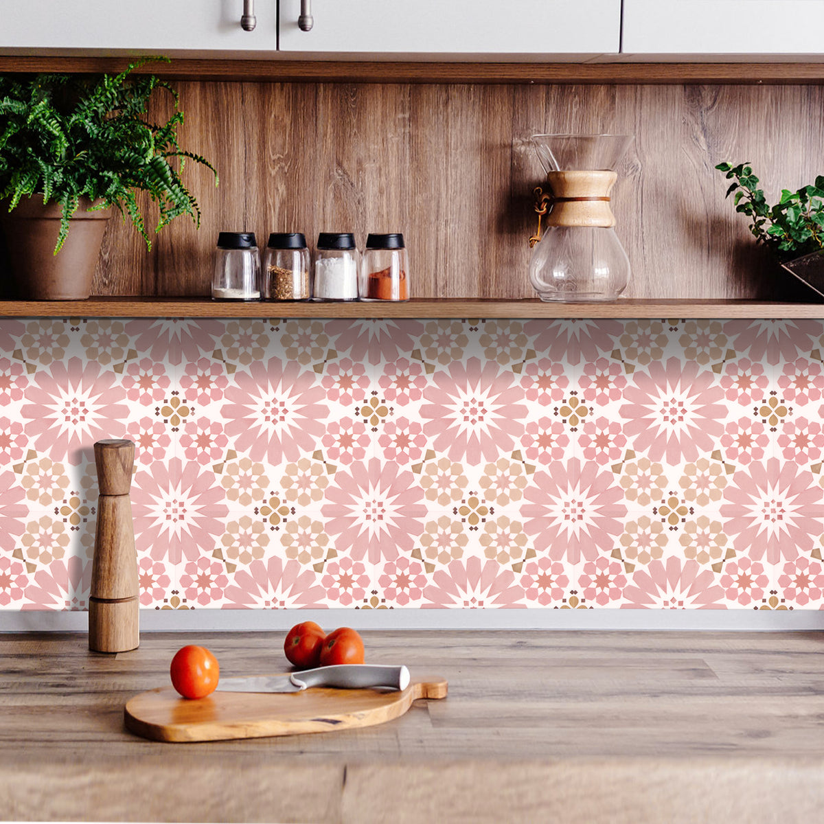Kitchen with wooden cabinets, a floral patterned backsplash, and a cutting board with fruits.
