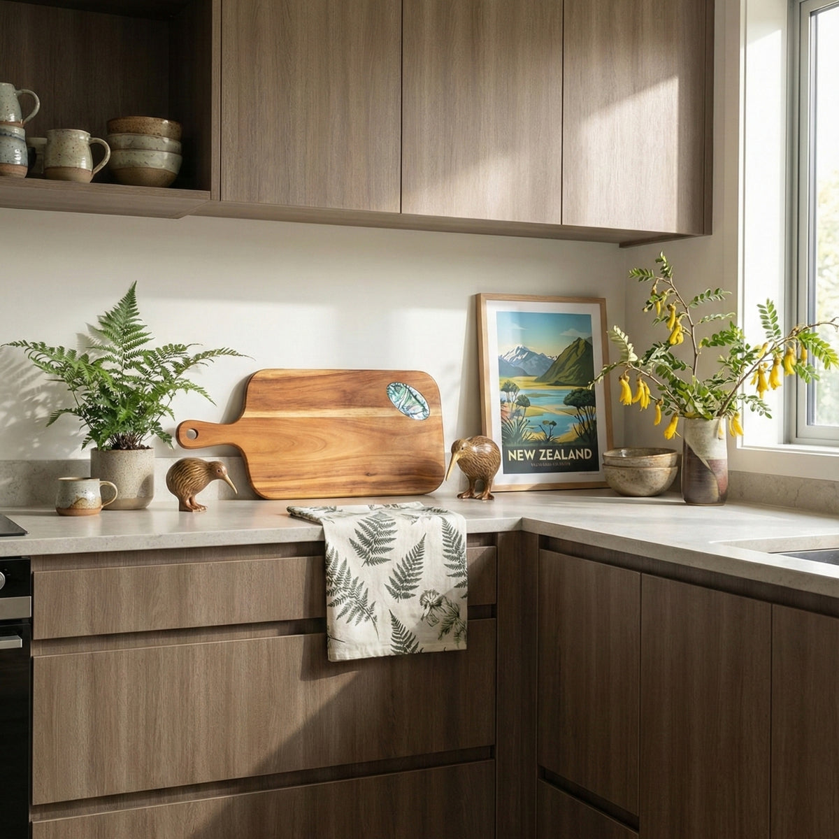 Modern kitchen with oak wood grain vinyl wrapped cabinets, countertop, and decor elements.