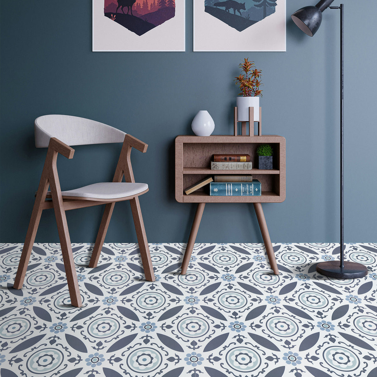 Modern interior with wooden chair, side table, and decorative items against a blue wall.