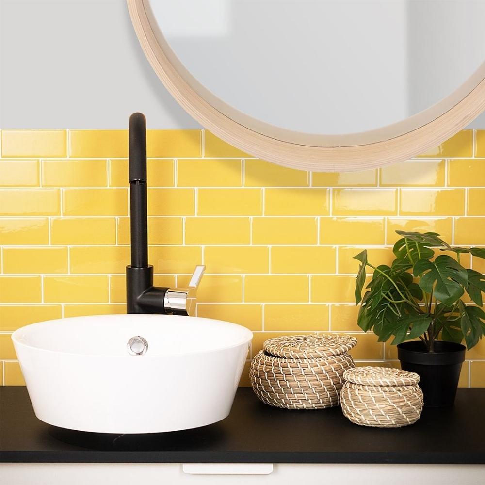 yellow self-adhesive 3D subway tile in a bathroom