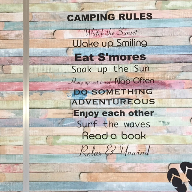 Camping table covered with colourful sticky back plastic and decals