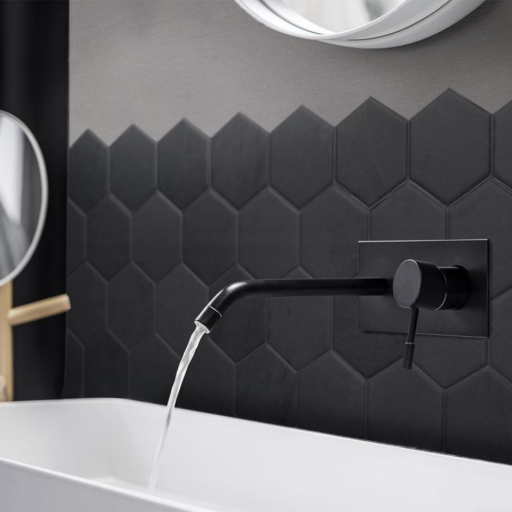 Black matte hexagon tiles in bathroom