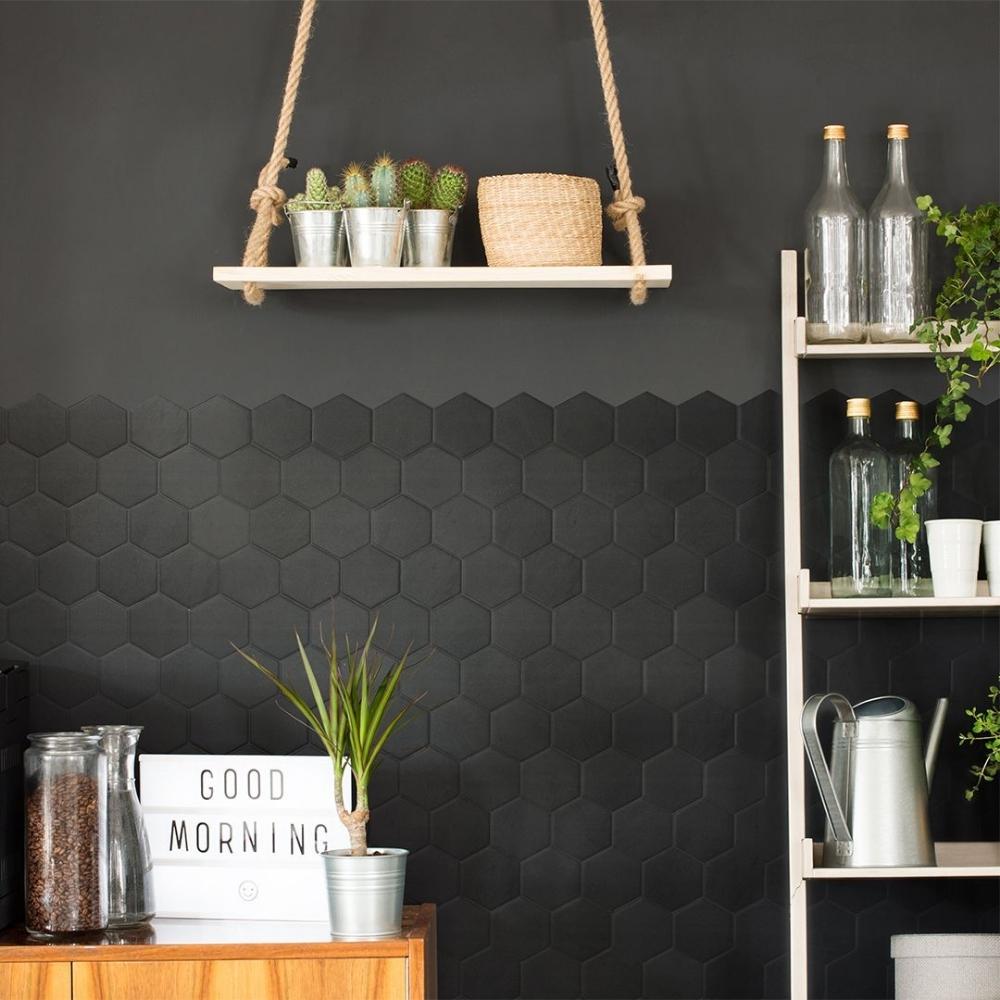 Black matte hexagon stick on tiles on wall