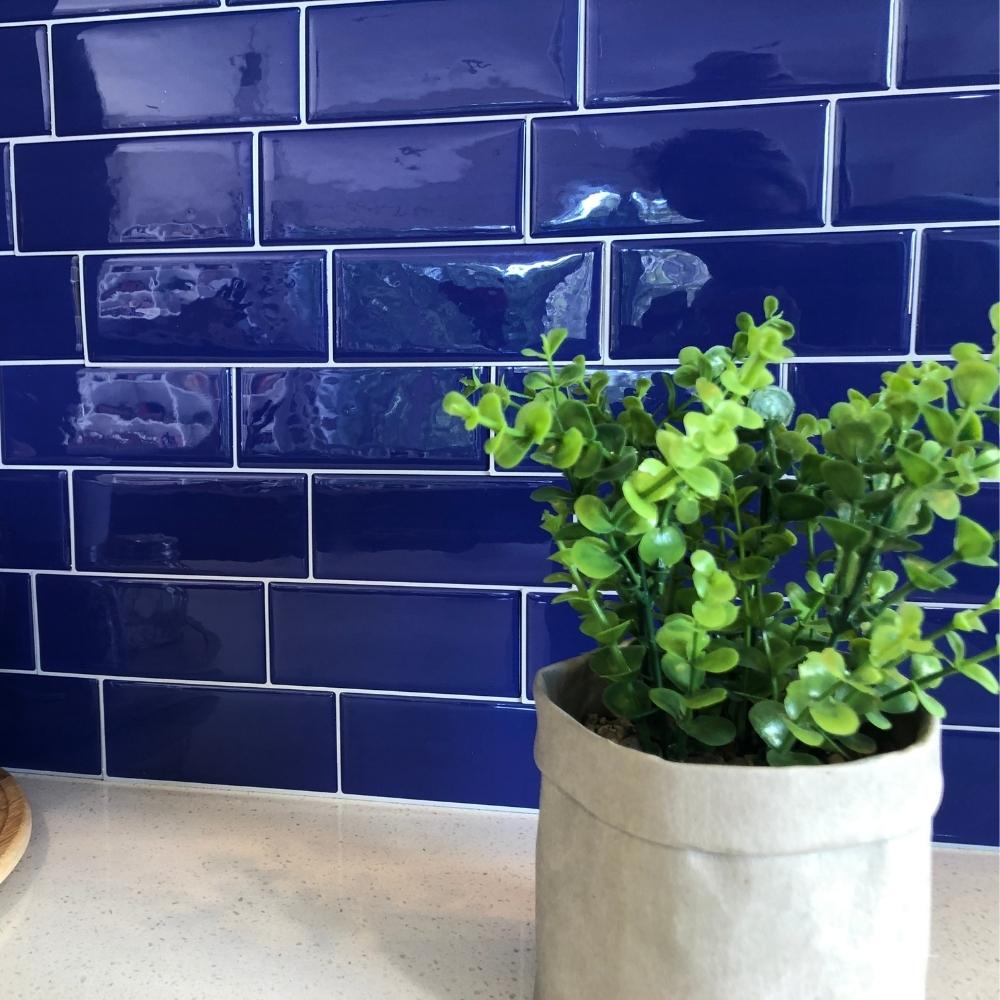 Blue self-adhesive 3D subway tile as a kitchen splashback