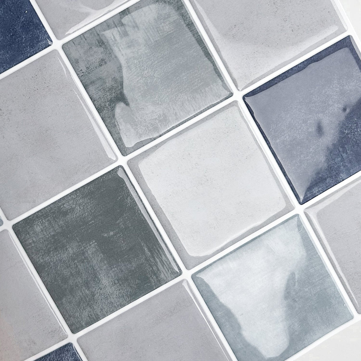 Blue, greige and green checkered tiles with white grout glossy finish
