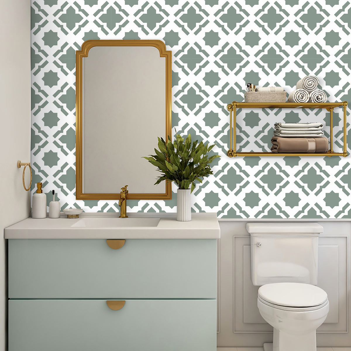 Bathroom with geometric patterned wallpaper, vanity, mirror, and toilet.