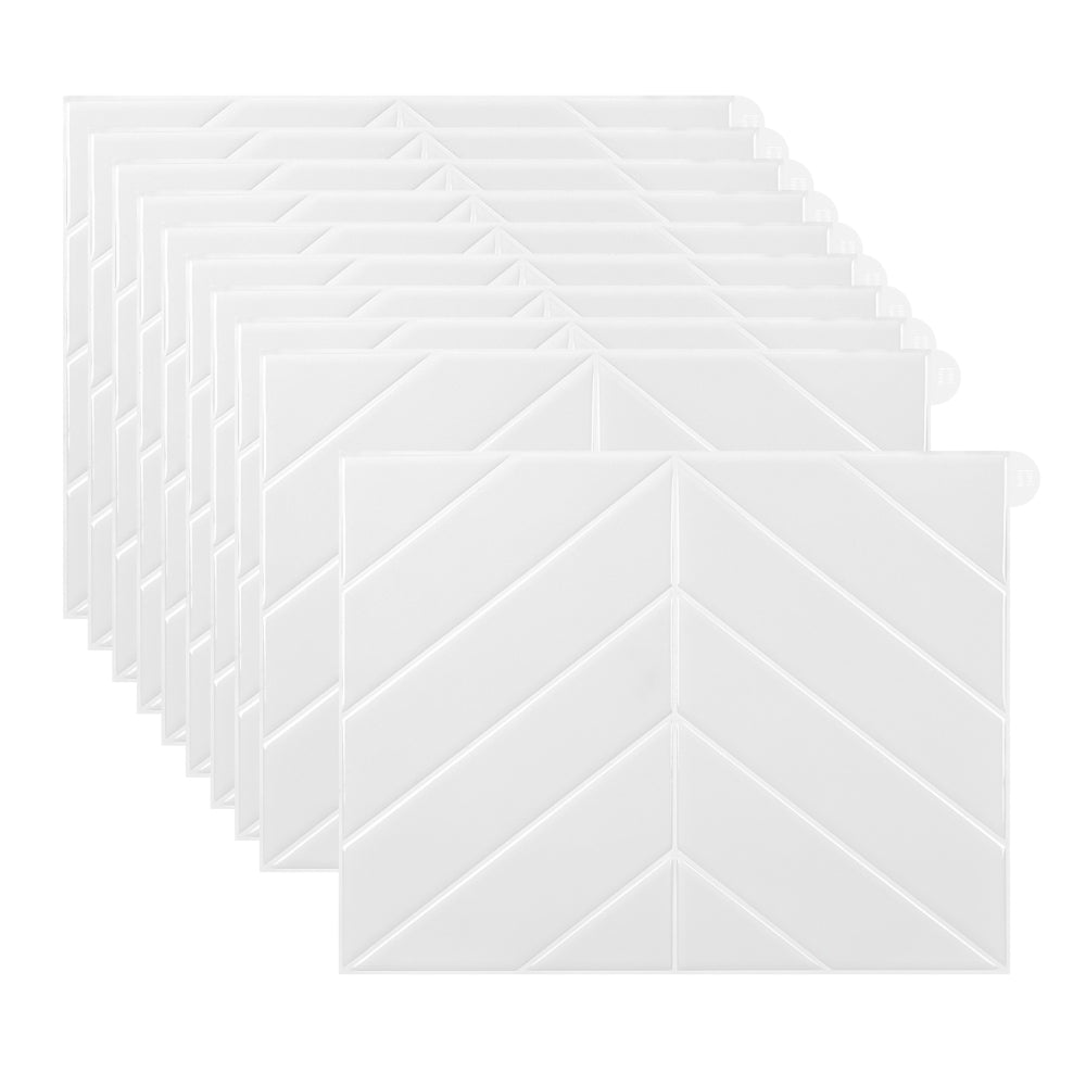 Set of white chevron-patterned tiles on a white background