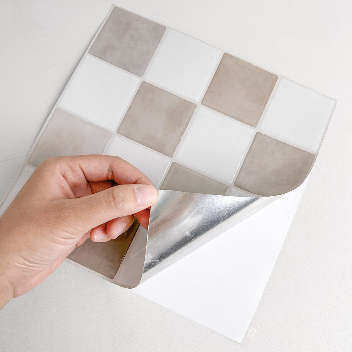 Cream and mocha checkered tiles with light brown grout peel and stick