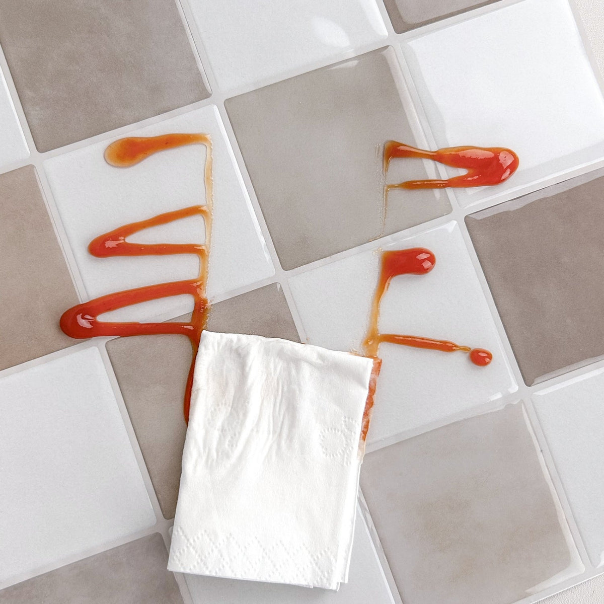 Cream and mocha checkered tiles with light brown grout easy to clean