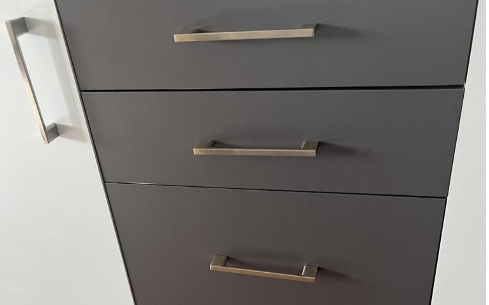 grey vinyl wrapped kitchen drawers