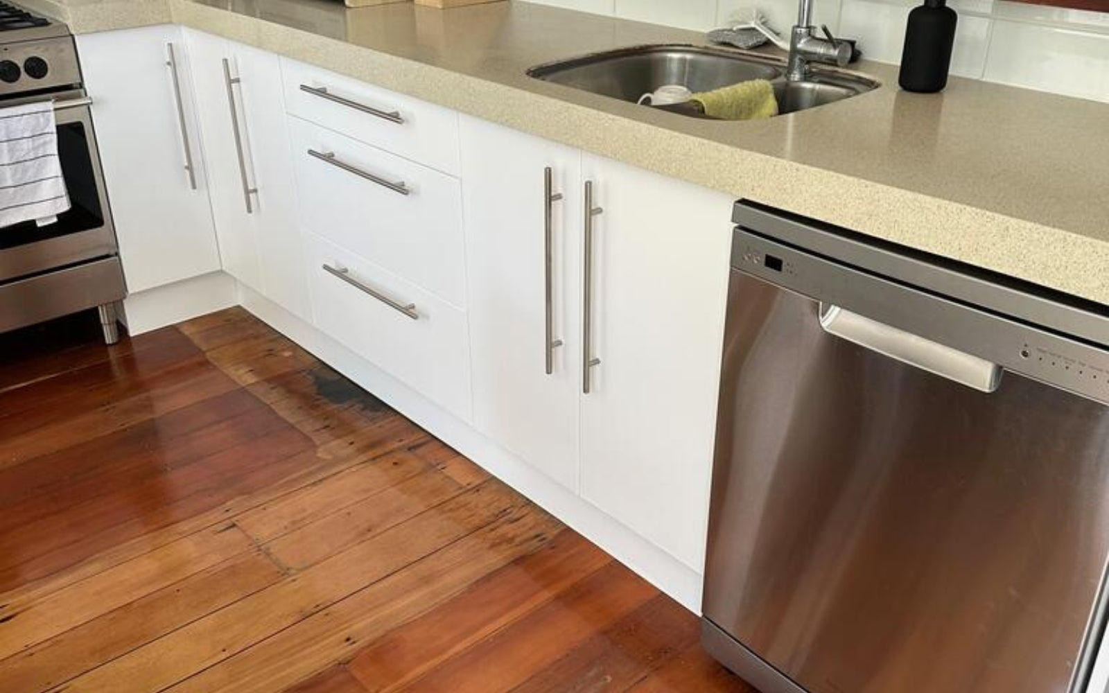white vinyl wrapped kitchen cupboards