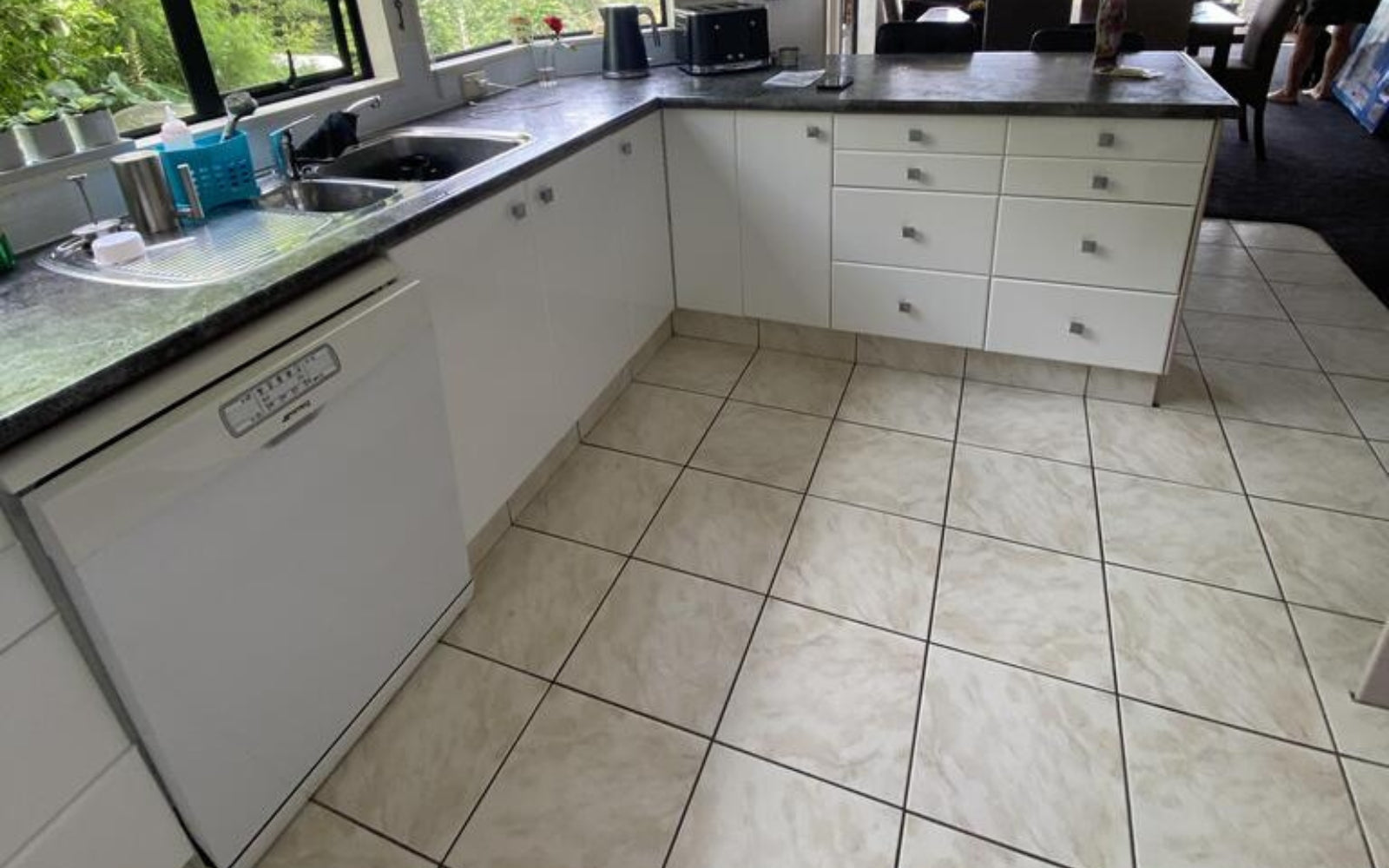 white vinyl wrapped kitchen cupboards