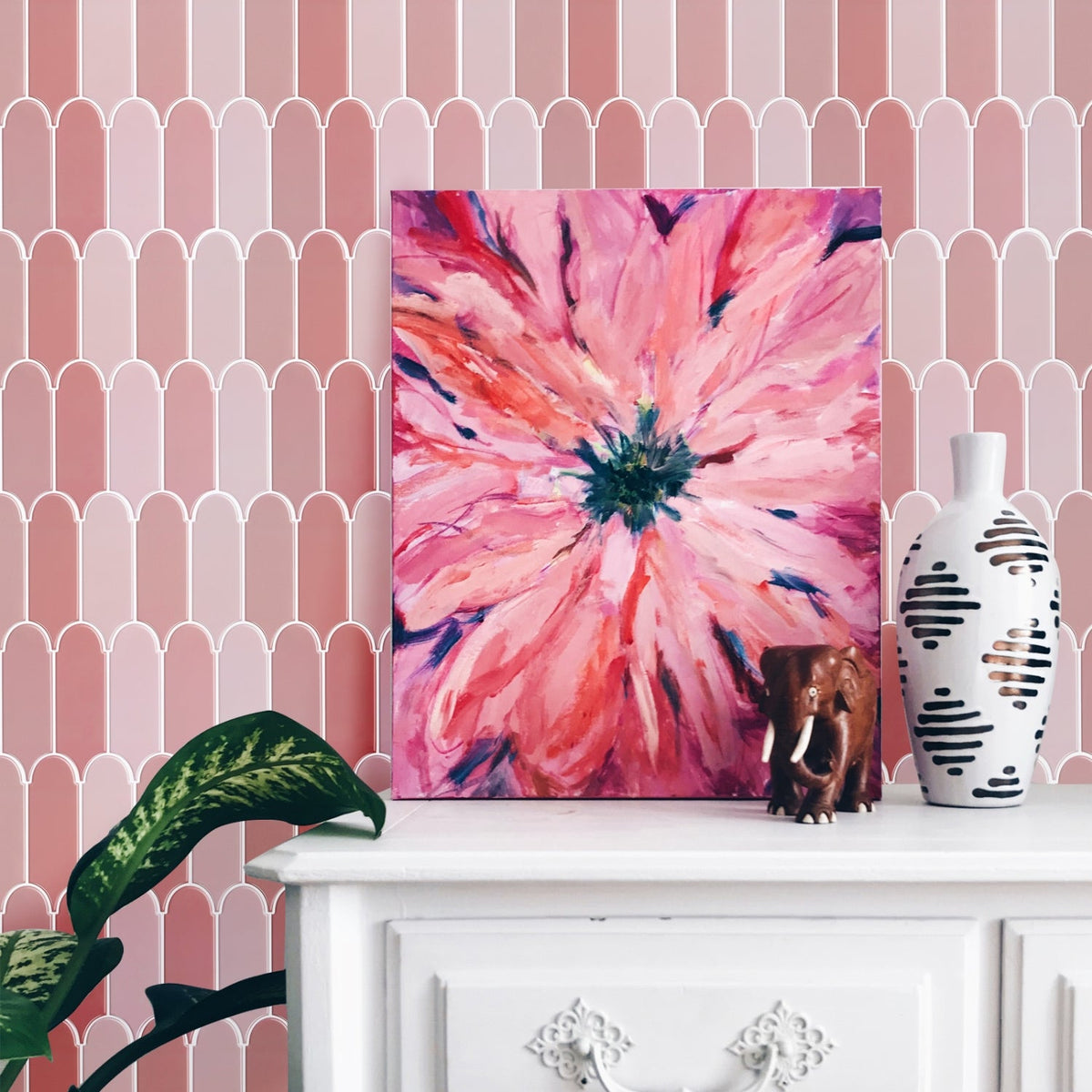 Pink feather peel and stick wall tiles with white grout