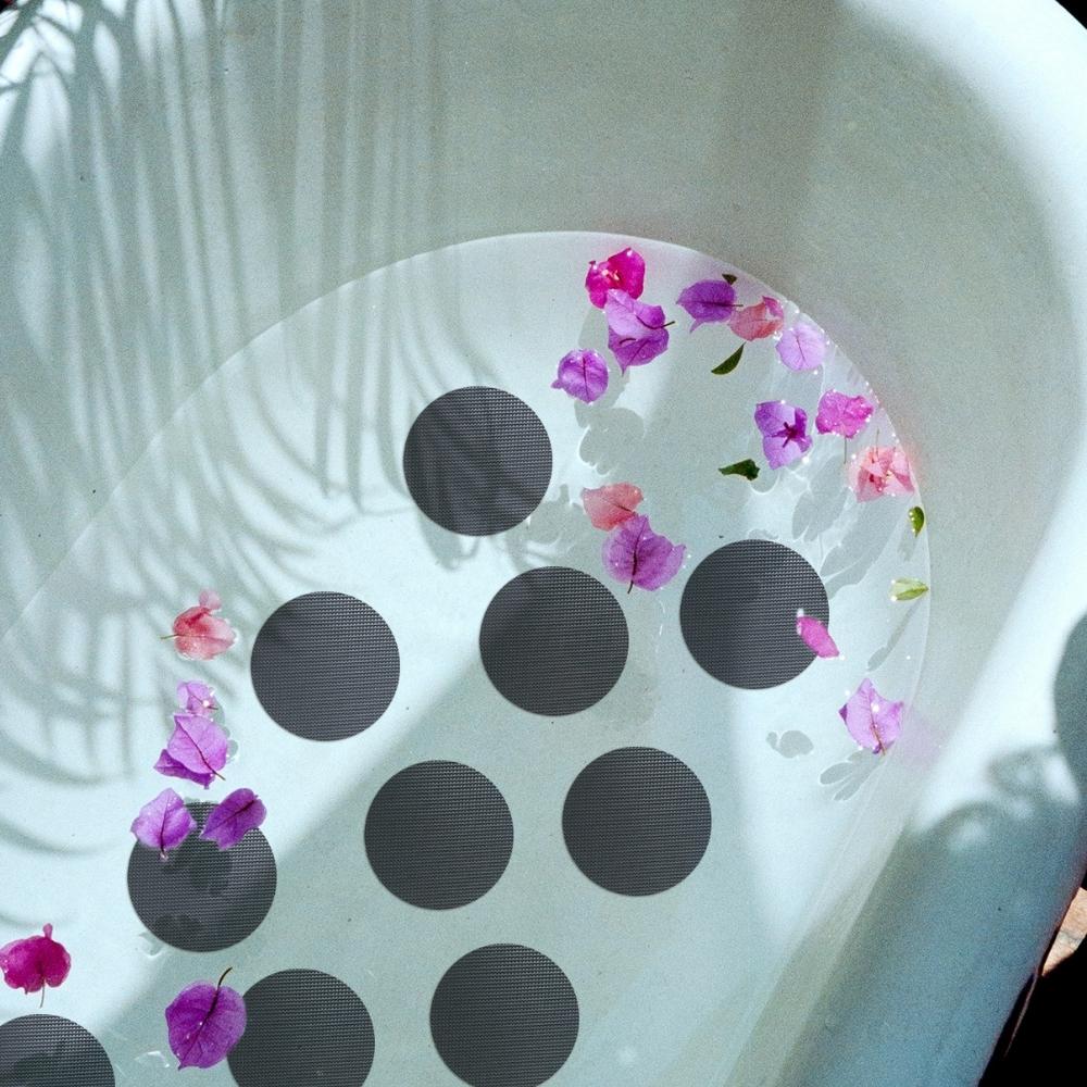 Grey anti-slip dots in bath tub