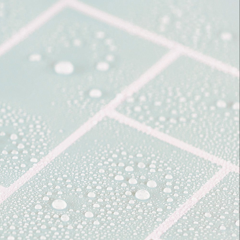 Waterproof mint green herringbone peel and stick tile