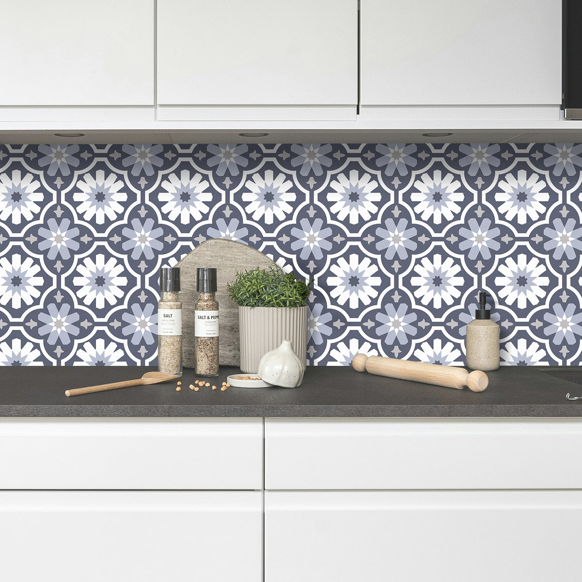 Kitchen with a decorative floral pattern on the backsplash