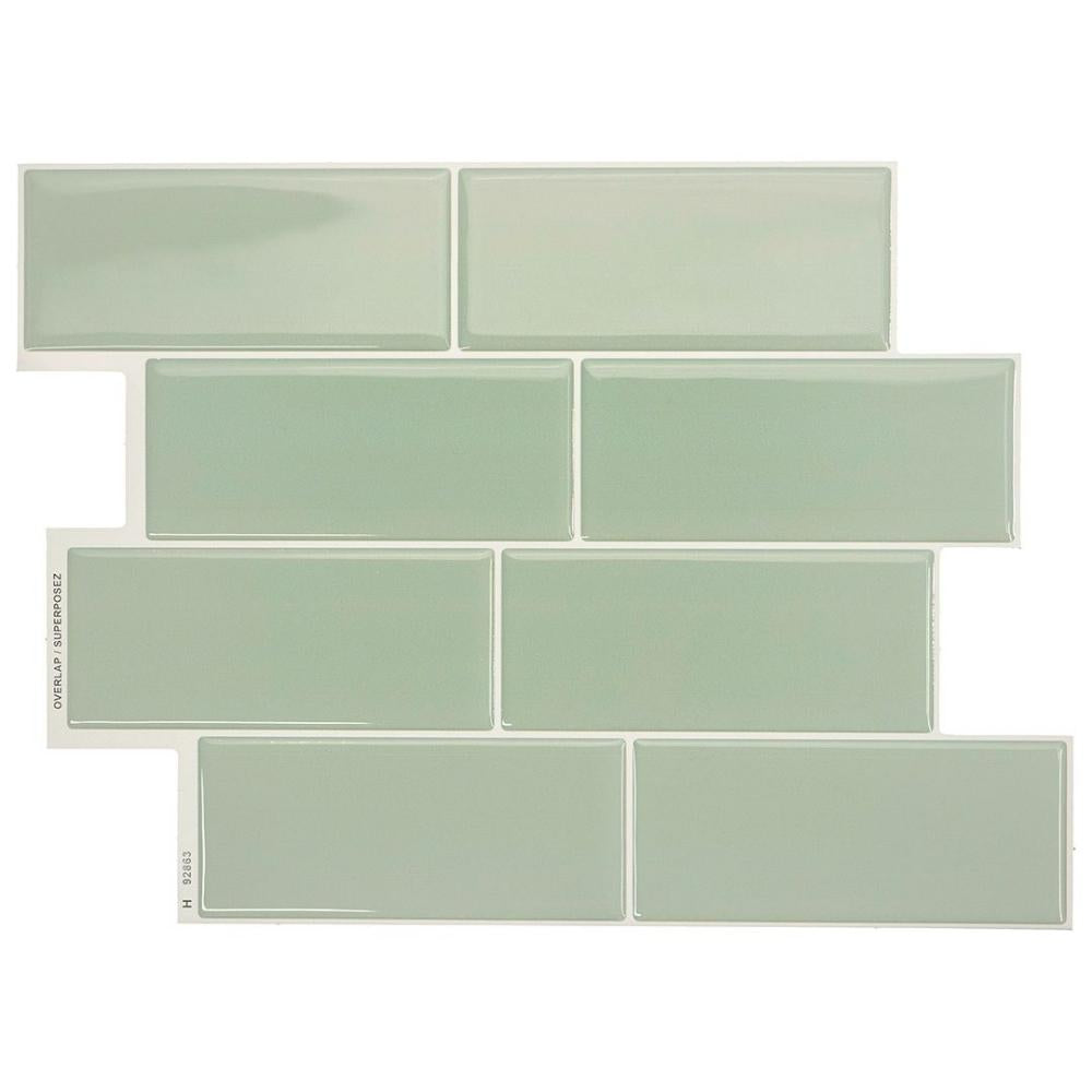 Mint green self-adhesive 3D subway tile in a kitchen