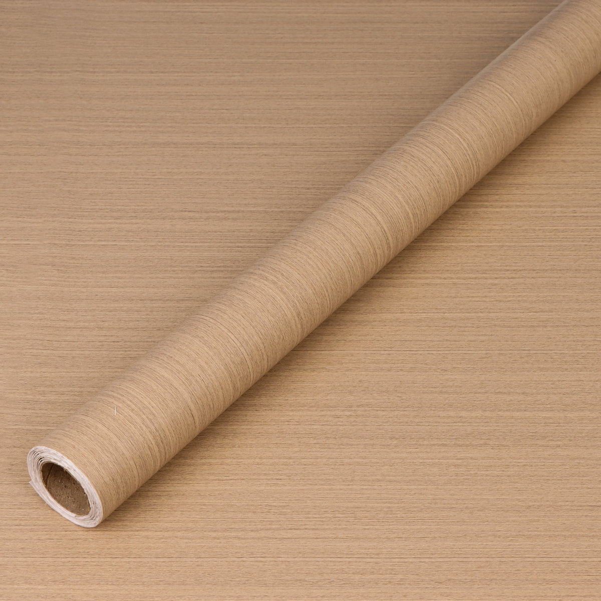 Roll of nordic ash adhesive vinyl on a brown background