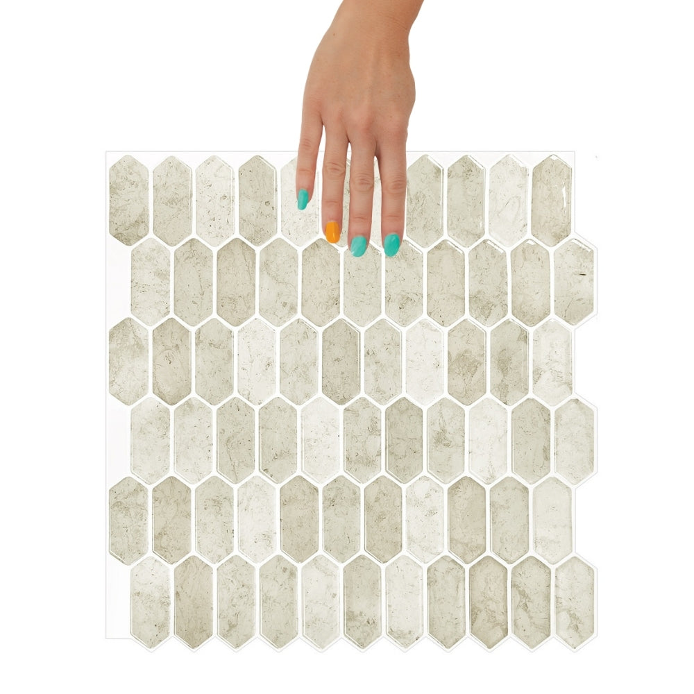 Hexagonal tile pattern with a hand for scale on a white background