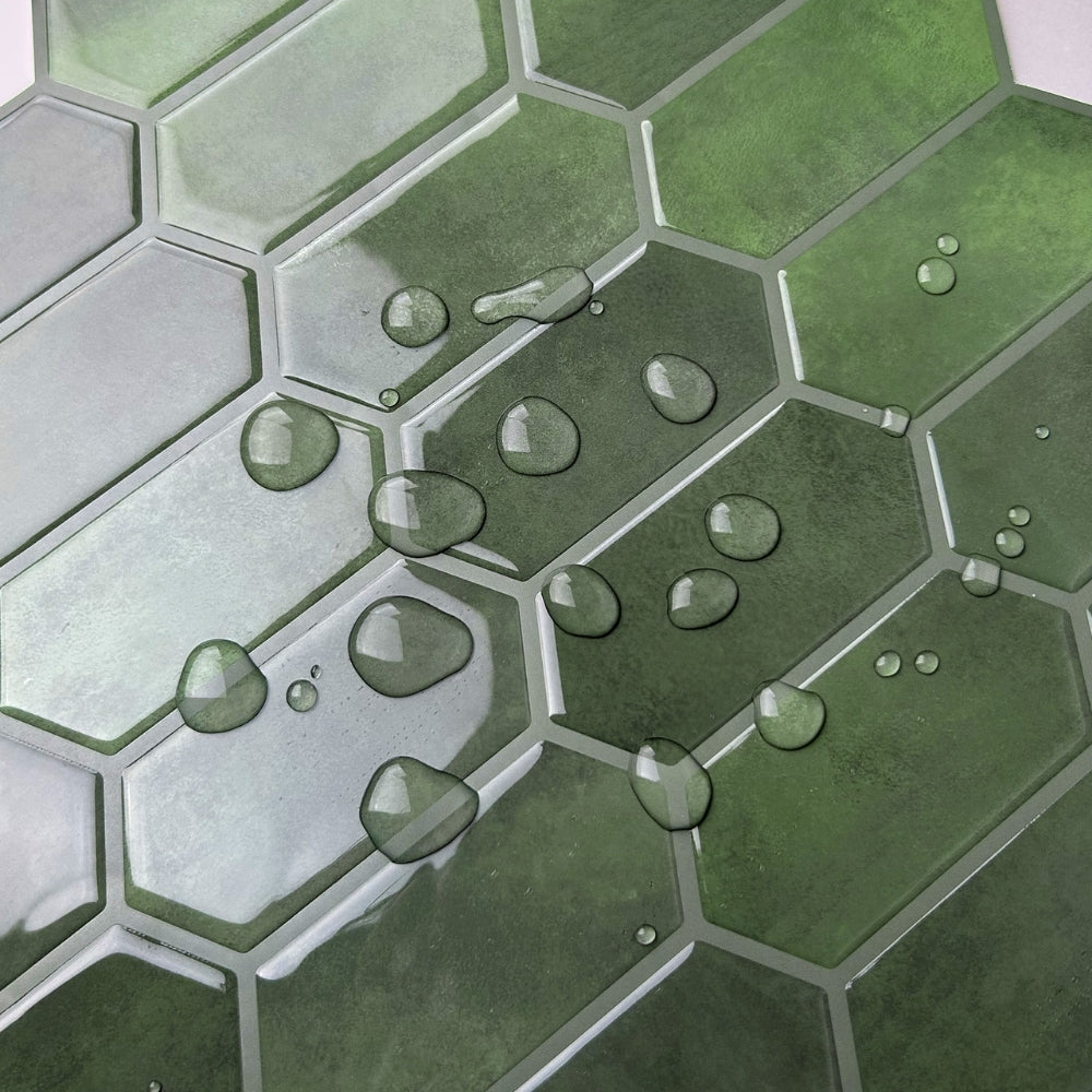 Hexagonal green tiles with water droplets on a white background