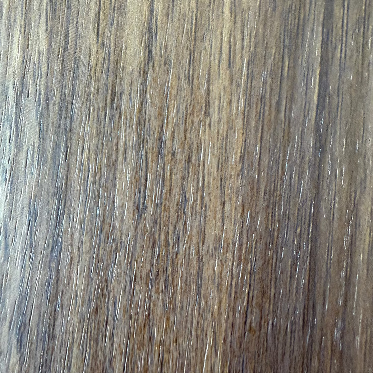Close-up of a walnut vinyl wrap
