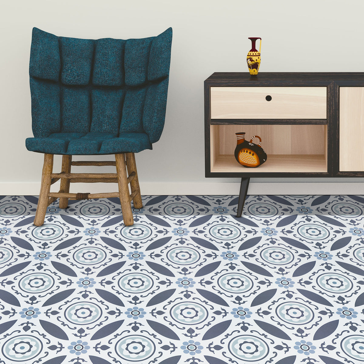 Patterned floor tiles with a blue chair and side table in the background
