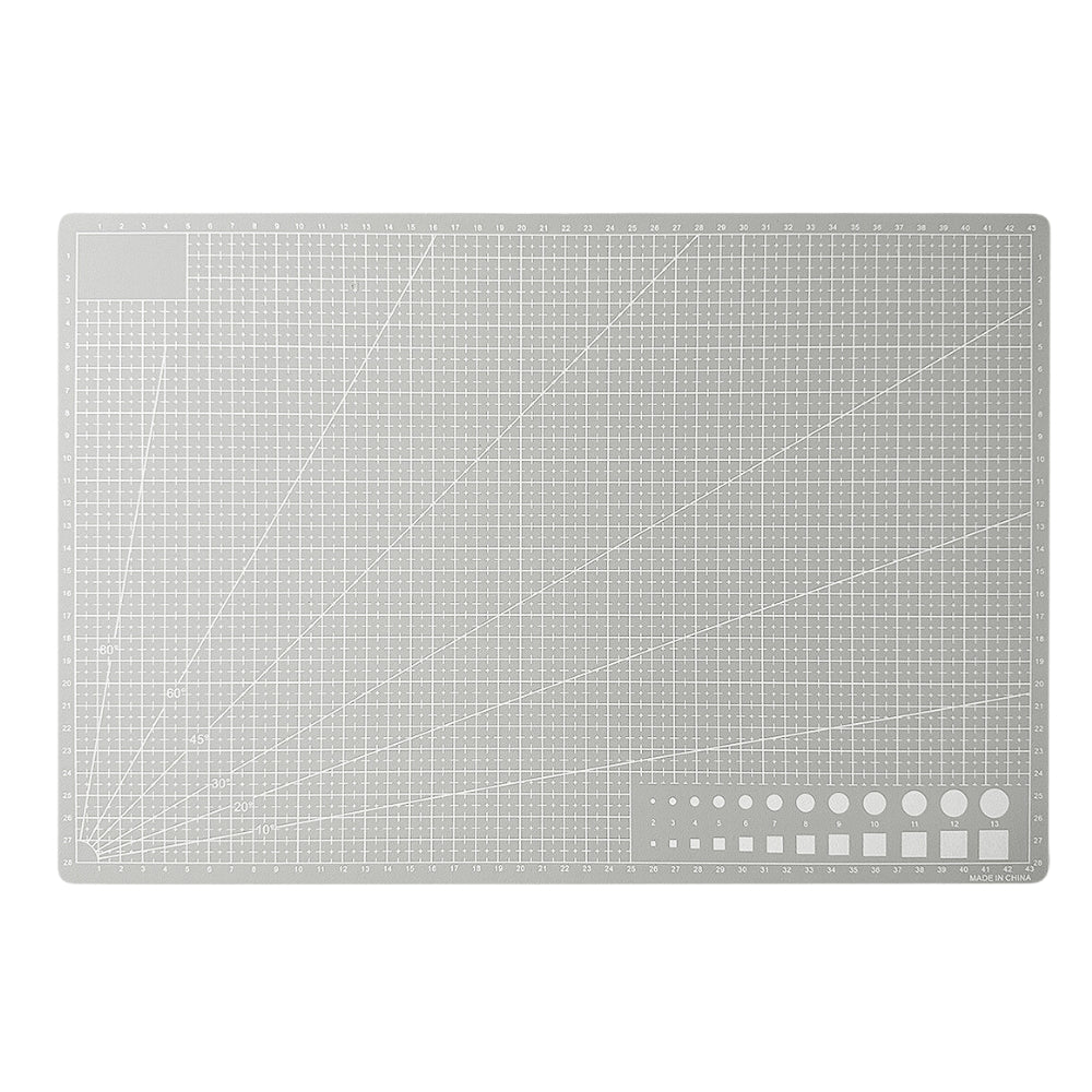 A3 grey self-healing craft mat that is reversible with grids