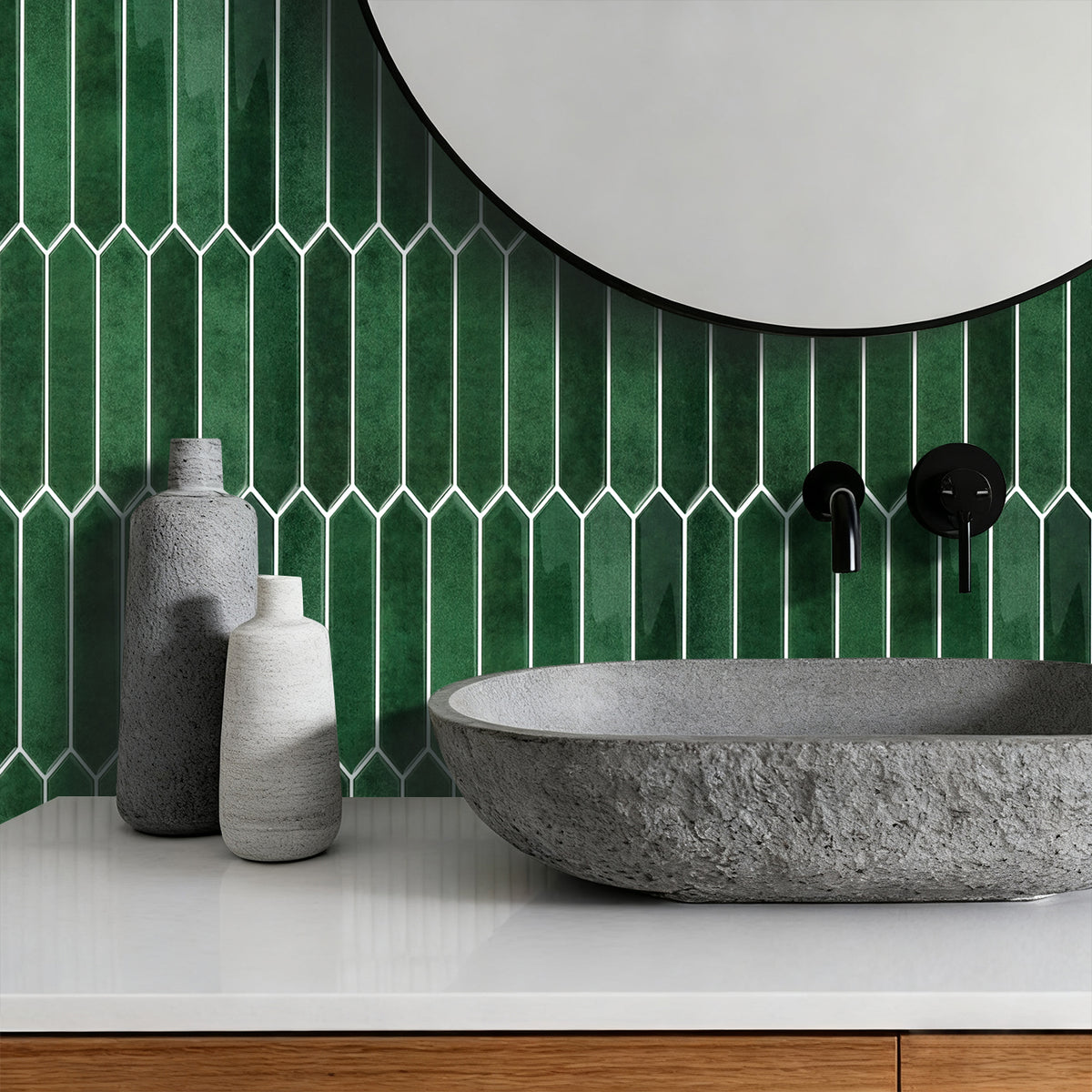 Bathroom with green picket tiled wall, stone sink, and vases.