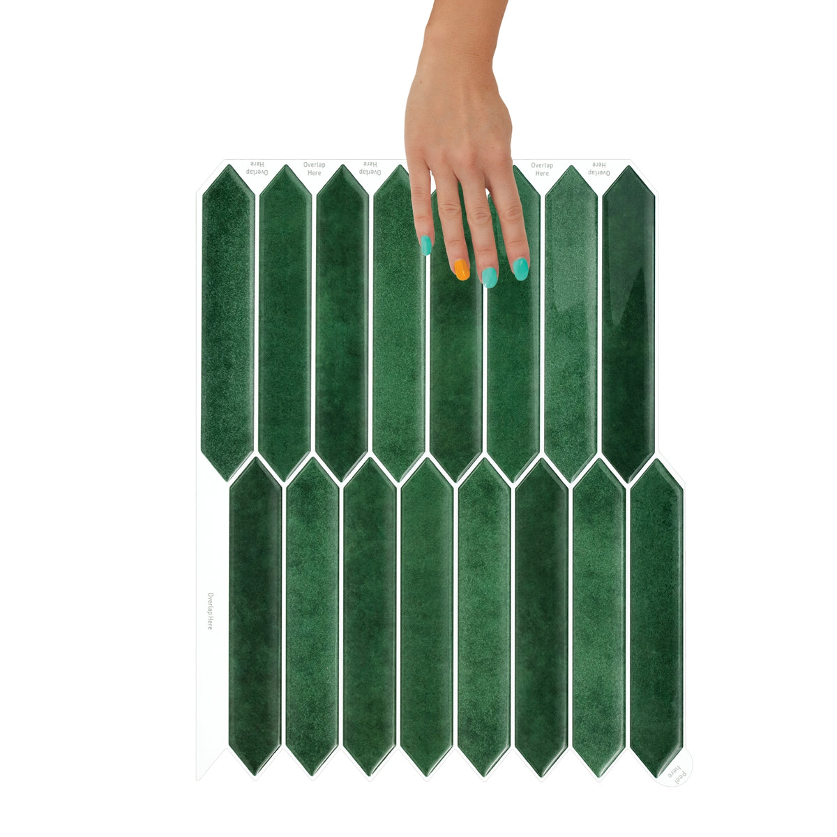 Green ceramic tiles with a hand holding one tile on a white background
