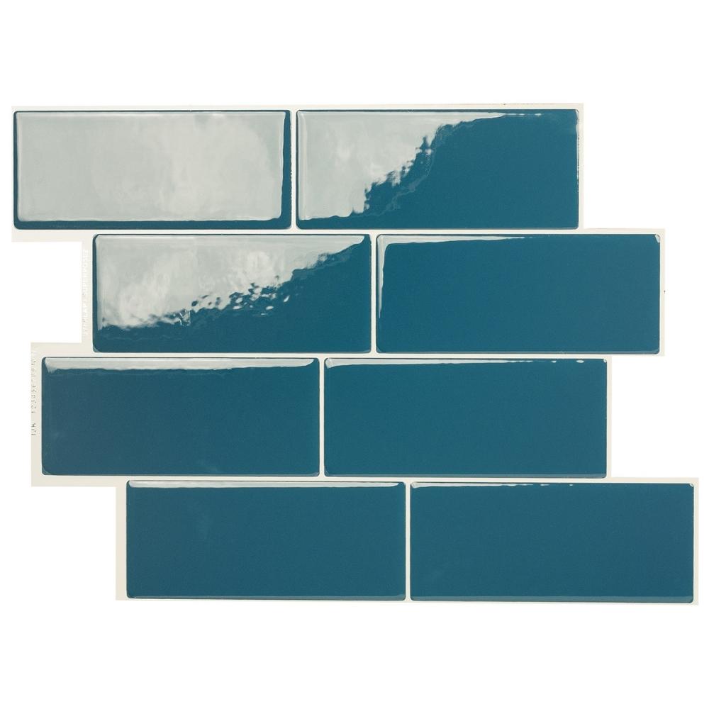 Teal self-adhesive 3D subway tile in a laundry