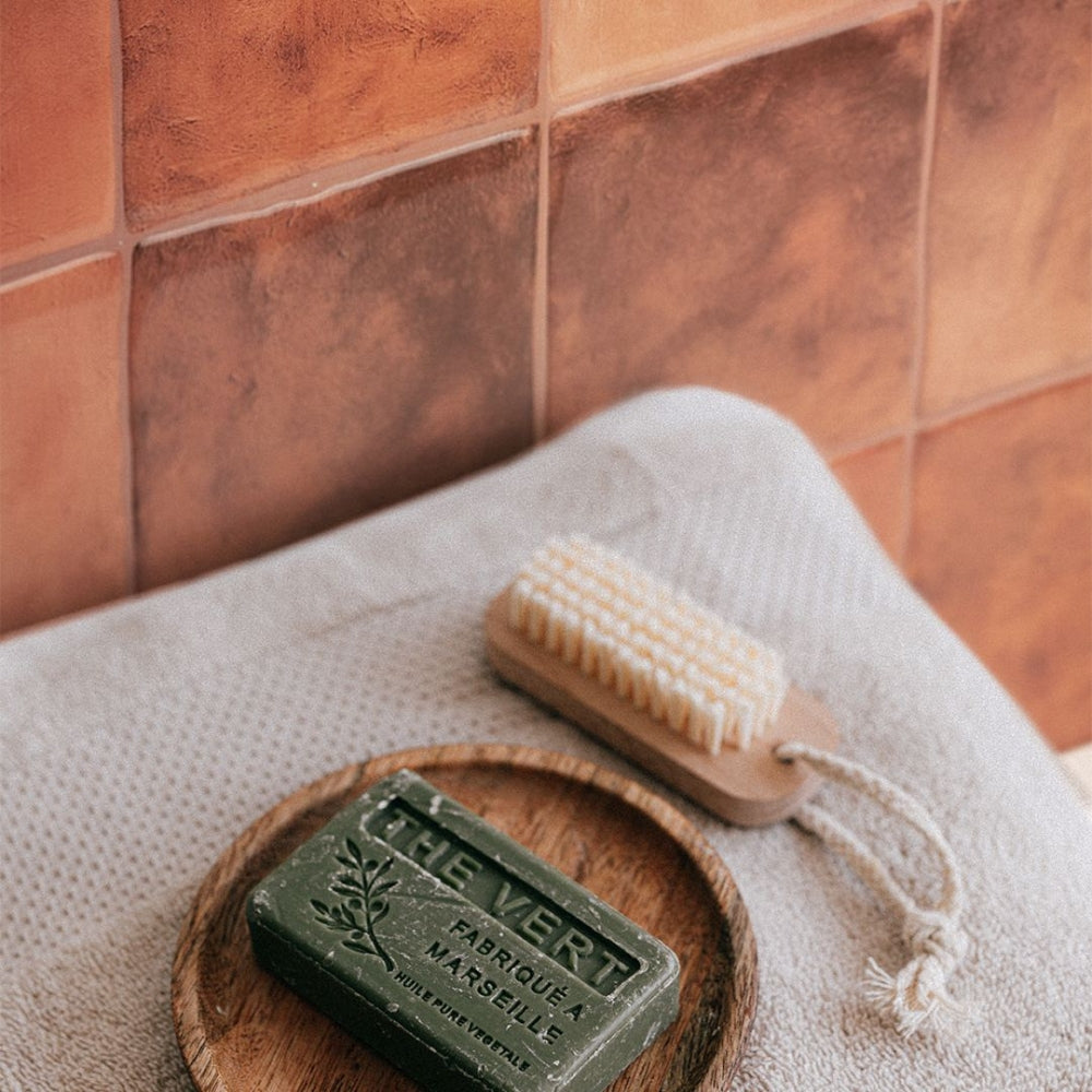 Square terracotta coloured tiles that is peel and stick