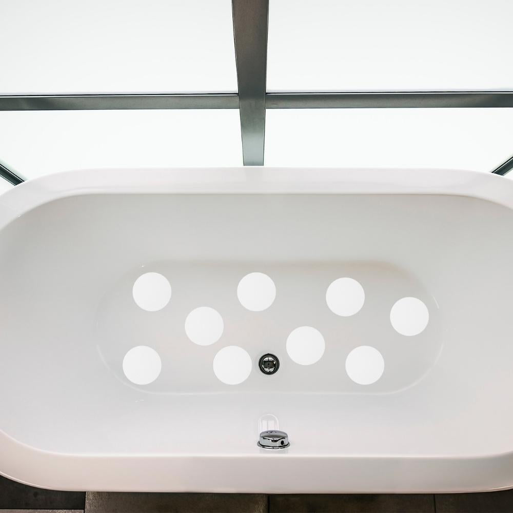 White anti-slip grip dots in bath
