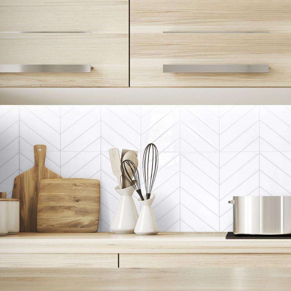White chevron self-adhesive 3D tiles with grey grout in kitchen