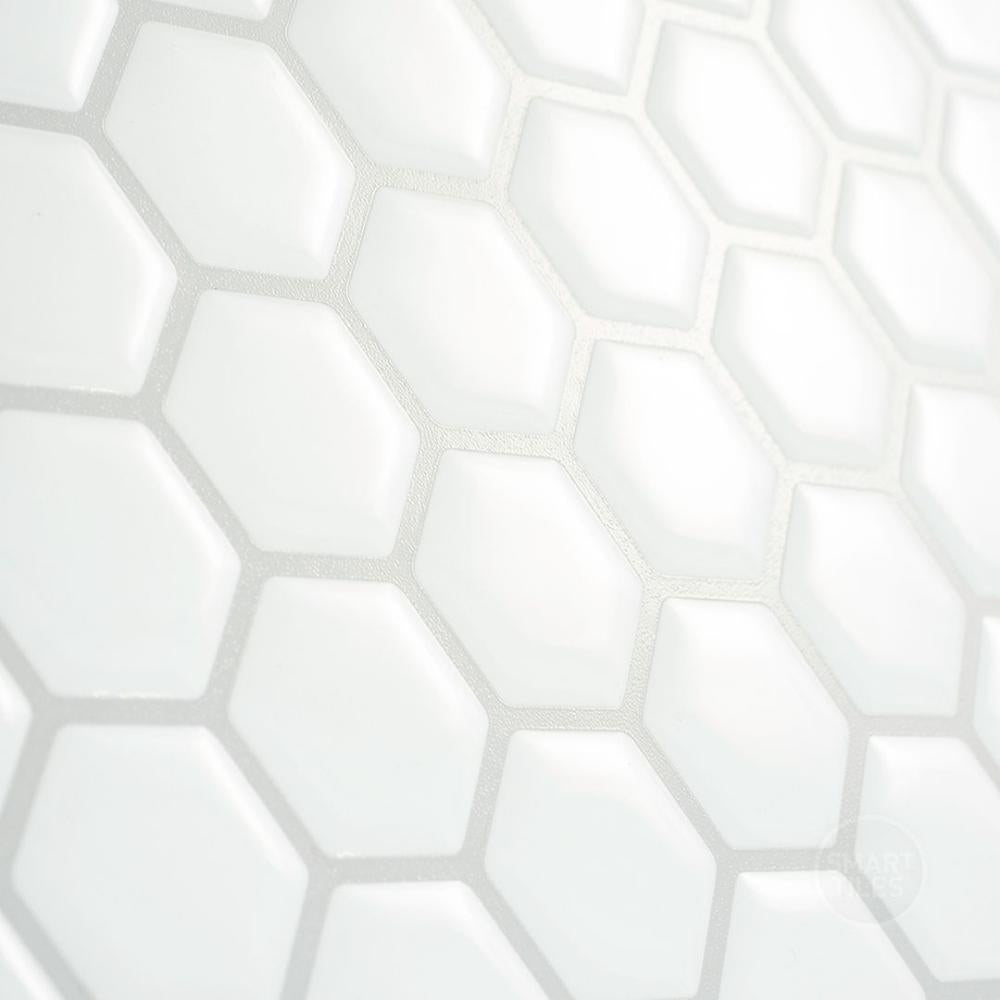 White hexagon stick on tiles with grey grout