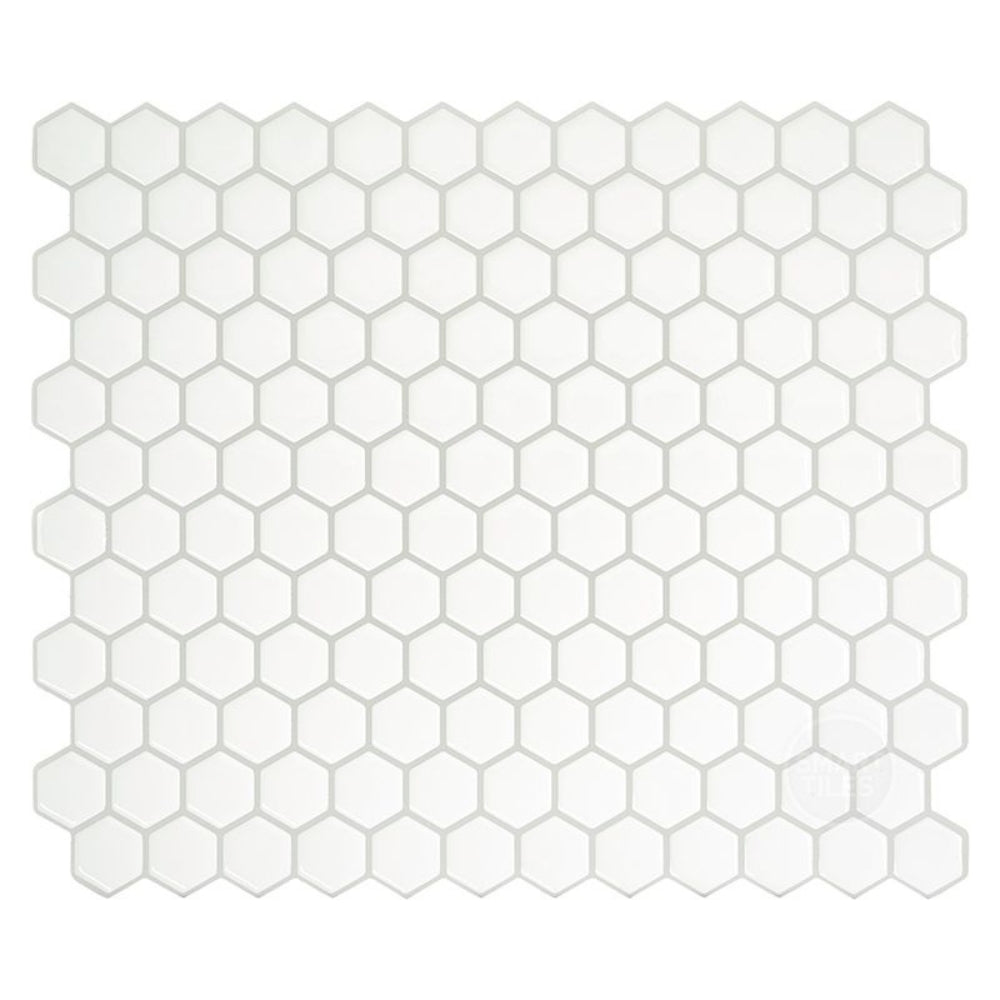 White peel and stick hexagon tiles with grey grout