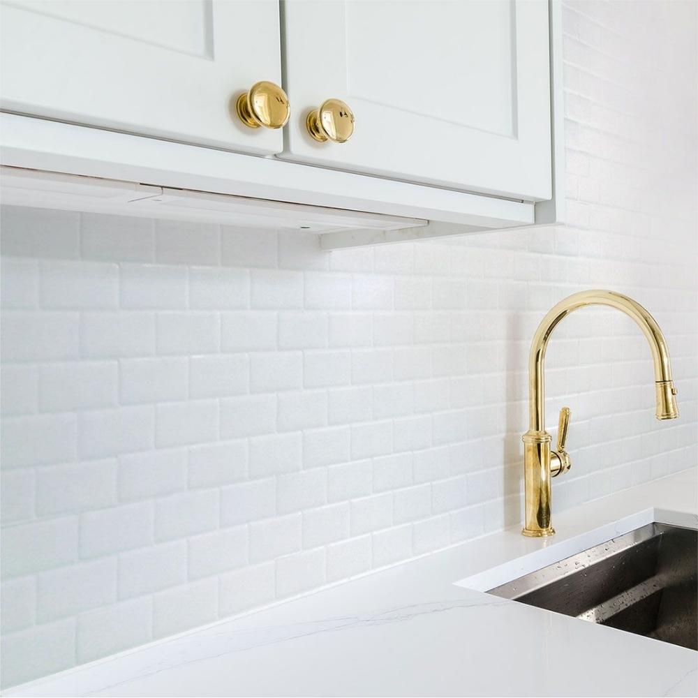 White subway self-adhesive 3D tiles with white grout in kitchen