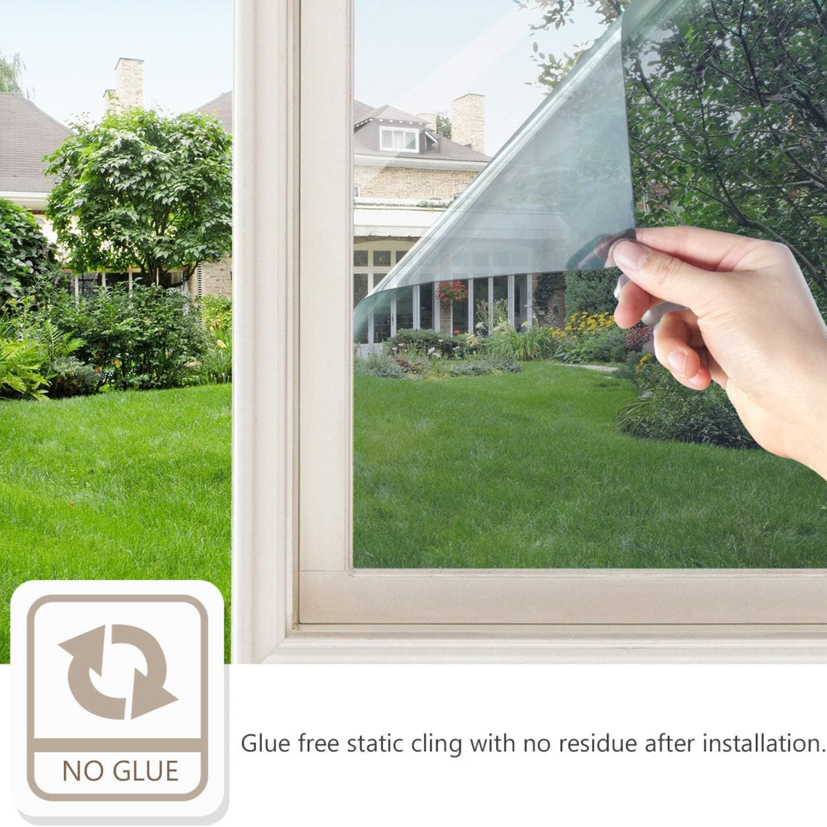 Hand applying a clear window film to a window with a view of a garden and house.