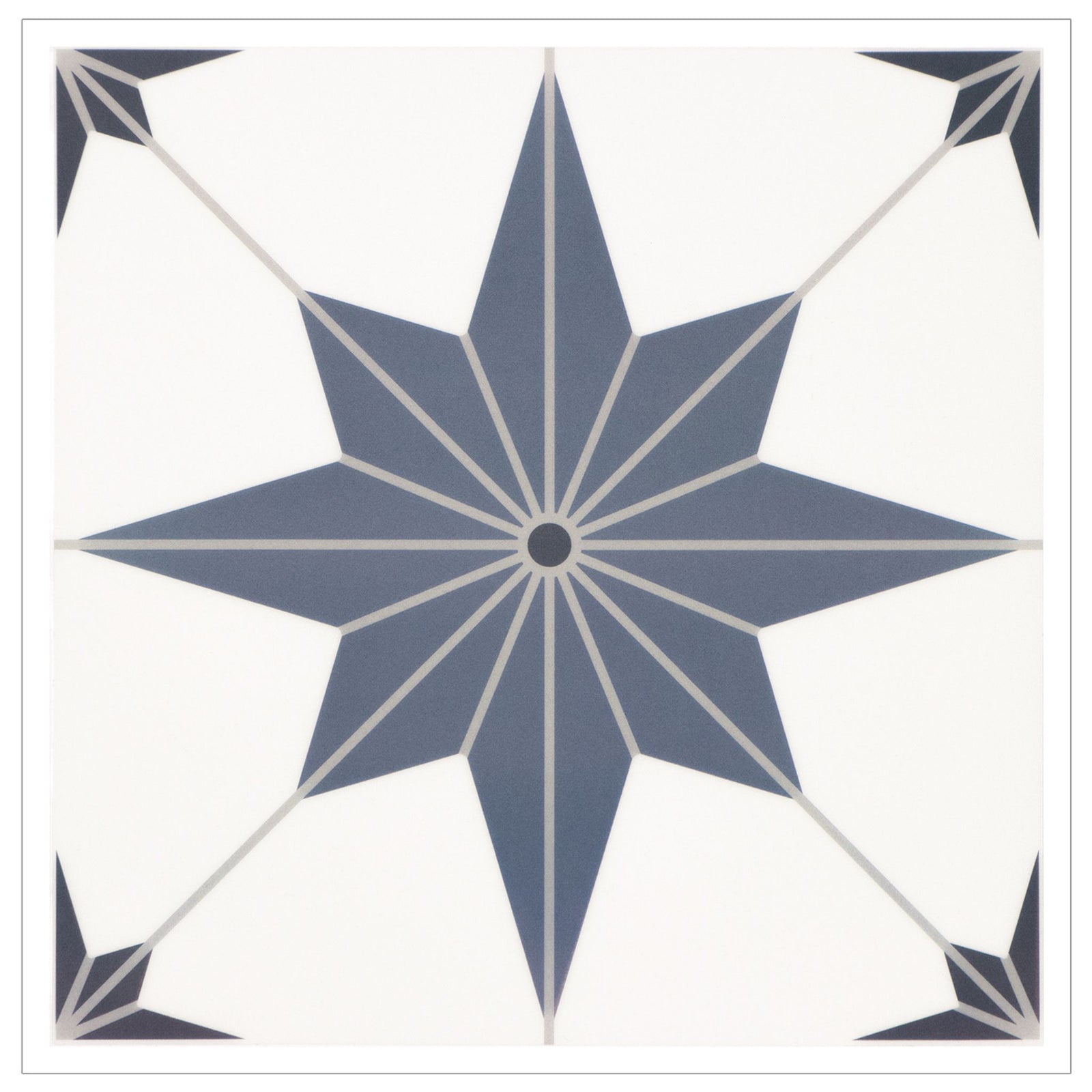 Porto Blue quick fix floor tiles in a star pattern on a lunge floor with a yellow arm chair and two white couches