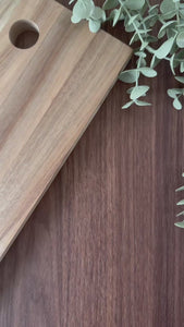 close up of walnut flat grain adhesive vinyl architectural grade