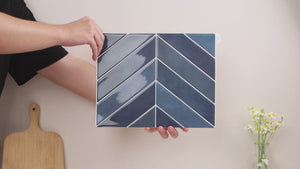 installation of blue chevron peel and stick tiles